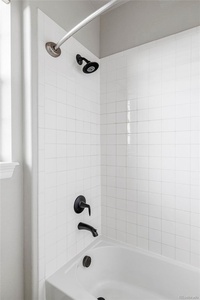 full bath with shower / tub combination