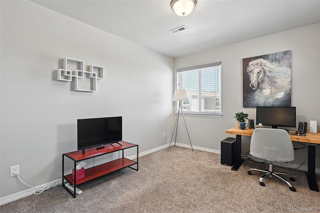 office with carpet flooring, visible vents, and baseboards
