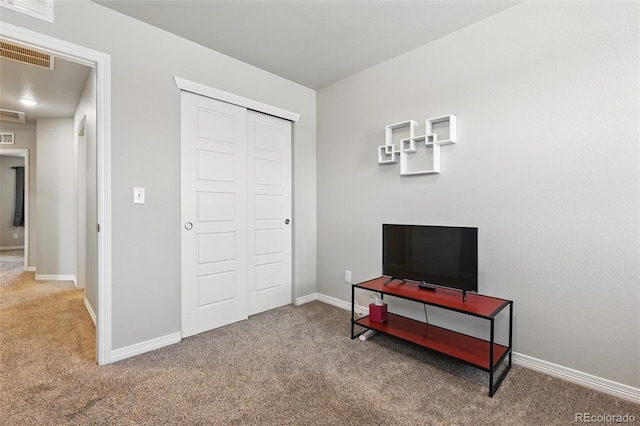 interior space with visible vents, baseboards, and a closet