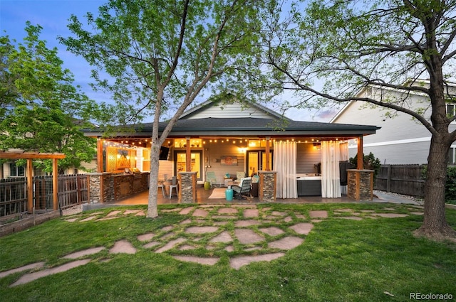 6480 Moss Cir, Arvada, CO 80007 - rear view of house featuring a fenced backyard and a patio
