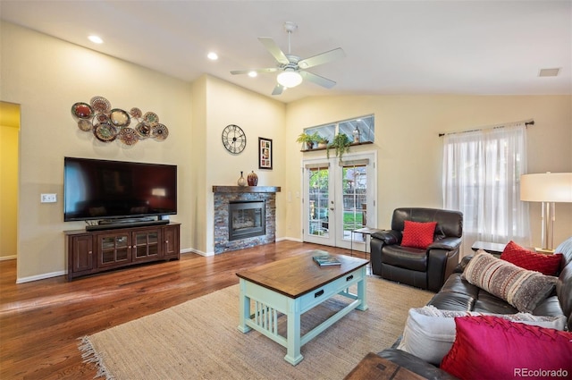 6480 Moss Cir, Arvada, CO 80007 - living area with plenty of natural light, wood finished floors, a ceiling fan, french doors, and recessed lighting