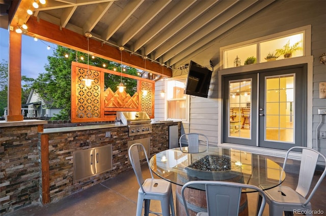 6480 Moss Cir, Arvada, CO 80007 - view of patio featuring outdoor dining space and exterior kitchen
