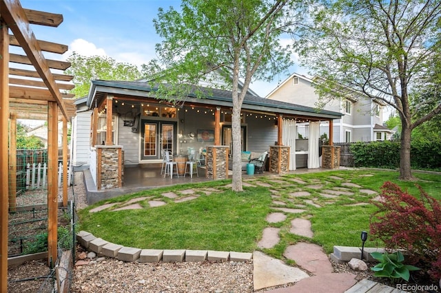 6480 Moss Cir, Arvada, CO 80007 - rear view of house featuring french doors, a fenced backyard, and a patio area