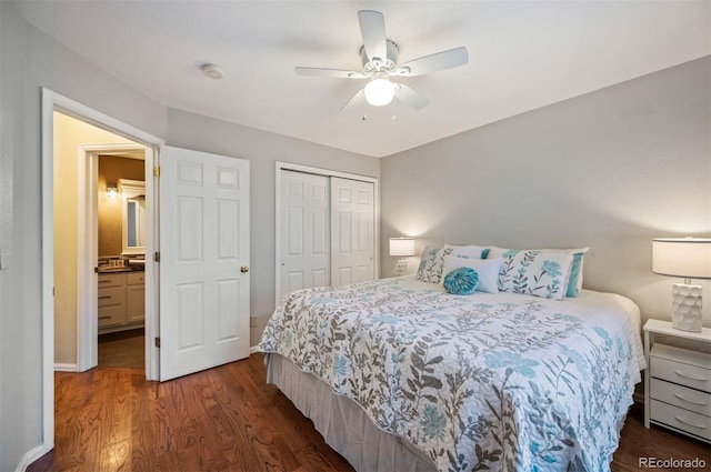 6480 Moss Cir, Arvada, CO 80007 - bedroom featuring dark wood-style floors, a closet, and ceiling fan