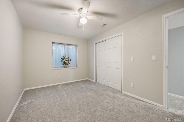 6480 Moss Cir, Arvada, CO 80007 - unfurnished bedroom with carpet, a closet, and ceiling fan