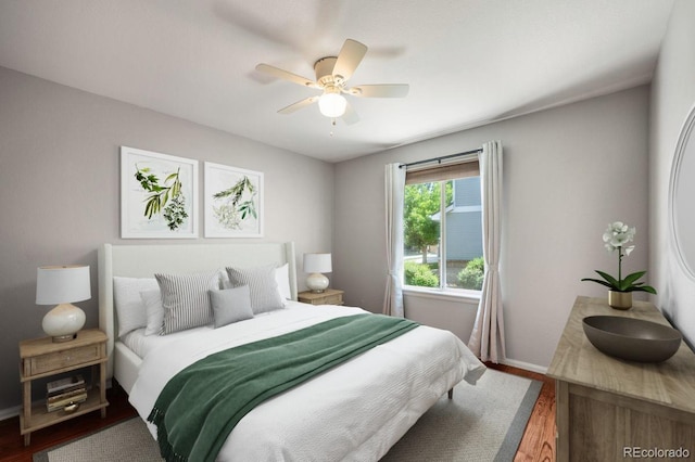 6480 Moss Cir, Arvada, CO 80007 - bedroom with wood finished floors and a ceiling fan