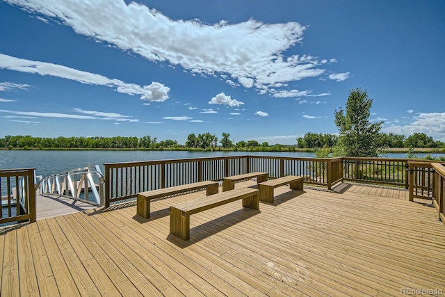 dock area with a deck with water view