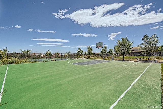 view of sport court featuring community basketball court and fence