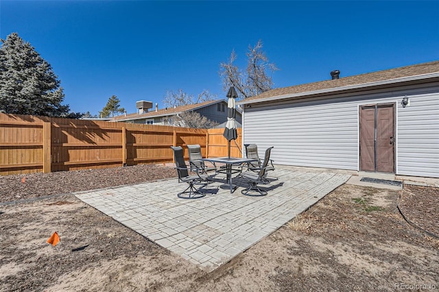 view of patio with fence