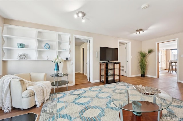 bedroom with hardwood / wood-style floors