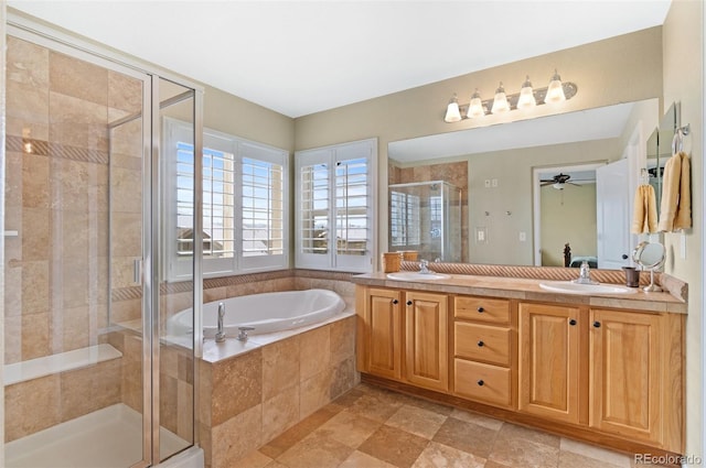 bathroom with vanity, ceiling fan, and separate shower and tub