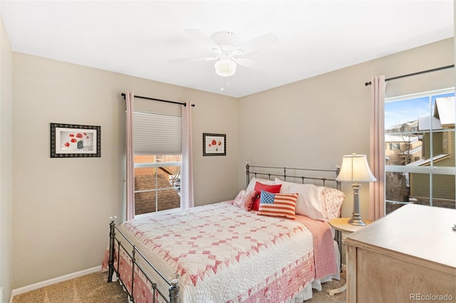 bedroom with light colored carpet and ceiling fan