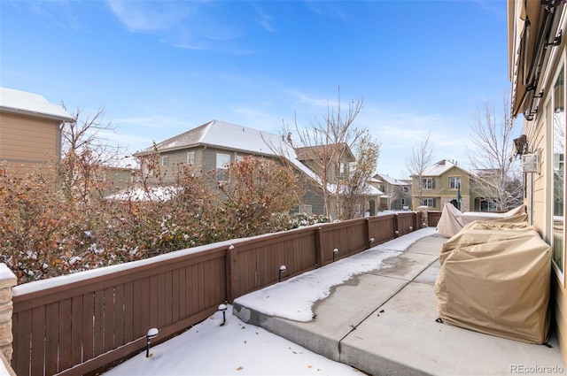 view of snow covered patio