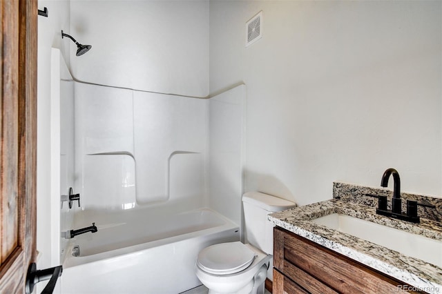 full bathroom featuring toilet, visible vents, tub / shower combination, and vanity