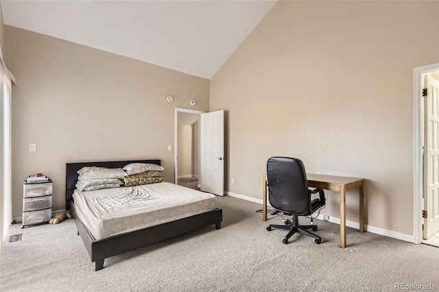 bedroom featuring carpet flooring and high vaulted ceiling