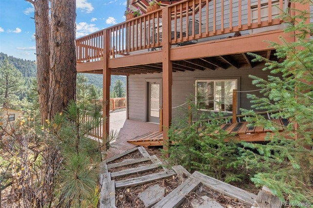 6904 Sprucedale Park Way, Evergreen, CO 80439 - view of patio featuring a deck