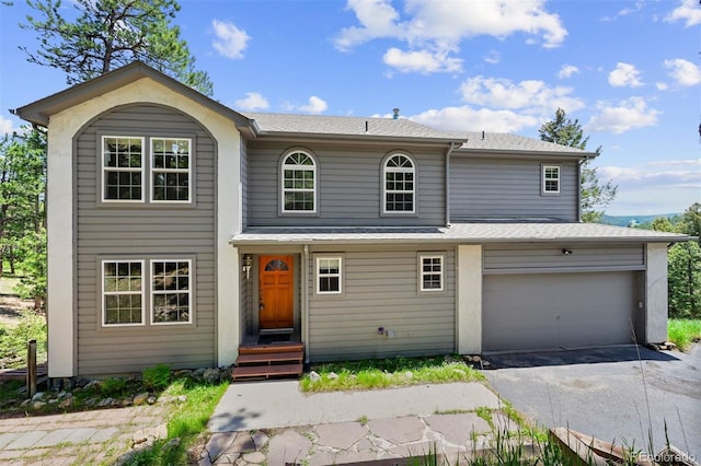 6904 Sprucedale Park Way, Evergreen, CO 80439 - traditional home with asphalt driveway and a shingled roof