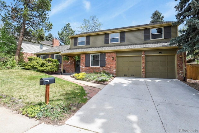 traditional-style house featuring brick siding, a garage, and driveway