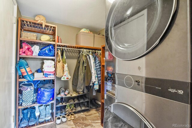 laundry area with estacked washer and dryer