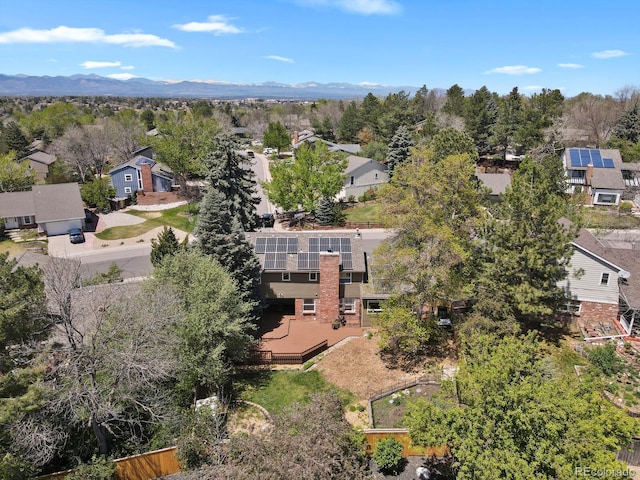 aerial perspective of suburban area featuring mountains