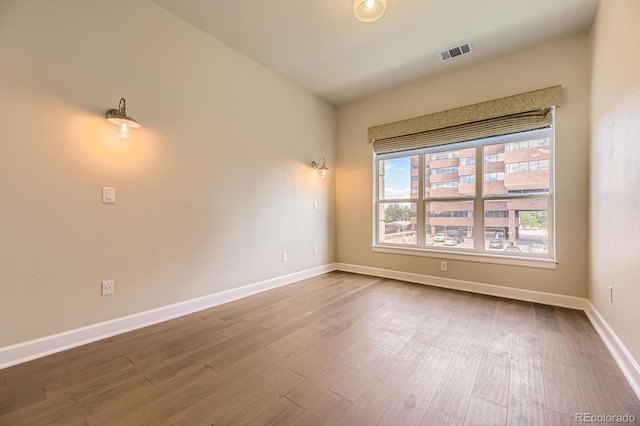 5677 S Park Pl Unit A308, Englewood, CO 80111 - spare room with wood finished floors and baseboards