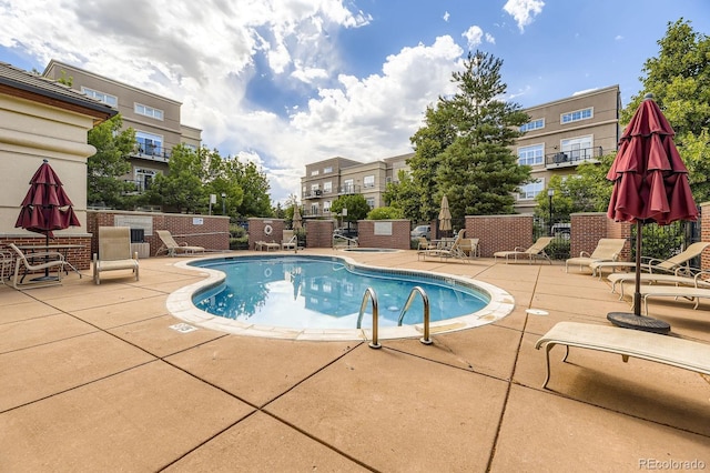 5677 S Park Pl Unit A308, Englewood, CO 80111 - community pool featuring a patio