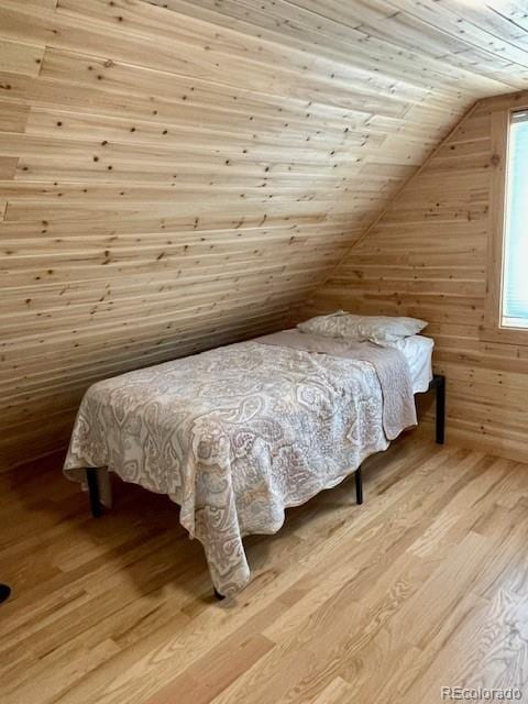 640 Ridgeway Dr, Cotopaxi, CO 81223 - bedroom featuring light wood-style floors, vaulted ceiling, and wood ceiling