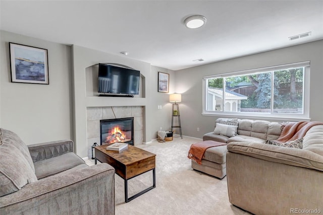 2602 Cove Creek Ct, Highlands Ranch, CO 80129 - living room featuring light colored carpet and a fireplace
