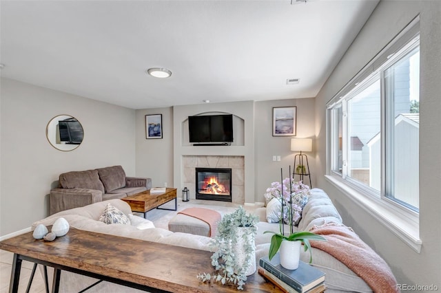 2602 Cove Creek Ct, Highlands Ranch, CO 80129 - living area with healthy amount of natural light and a fireplace