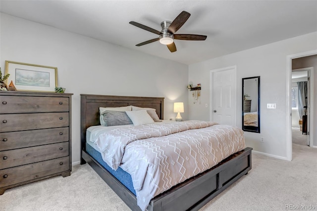 2602 Cove Creek Ct, Highlands Ranch, CO 80129 - bedroom with light carpet and a ceiling fan