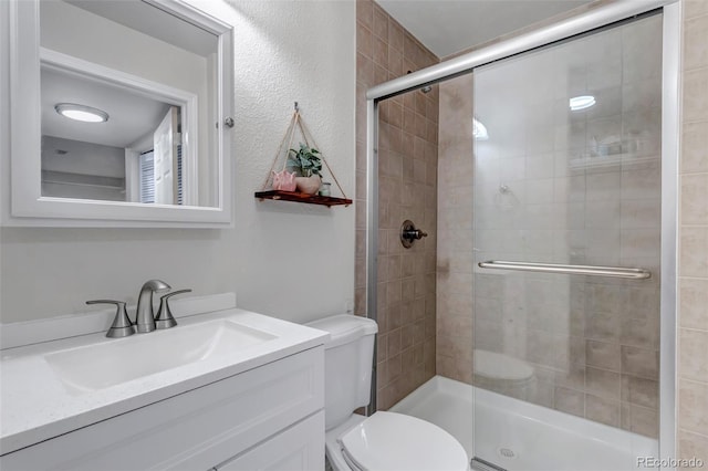 2602 Cove Creek Ct, Highlands Ranch, CO 80129 - bathroom with a stall shower and vanity