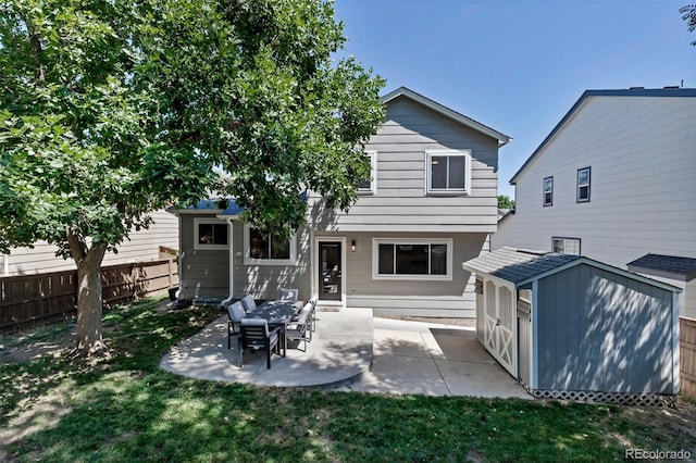 2602 Cove Creek Ct, Highlands Ranch, CO 80129 - back of house with a shed and a patio
