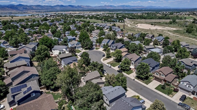 2602 Cove Creek Ct, Highlands Ranch, CO 80129 - aerial perspective of suburban area with a mountainous background