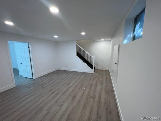 983 Xenon, Golden, CO 80401 - basement with wood finished floors, stairs, and recessed lighting