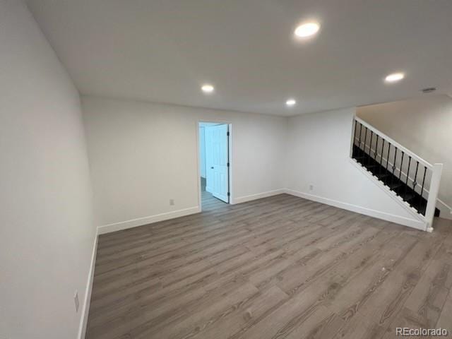 basement featuring hardwood / wood-style flooring