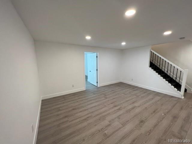 983 Xenon, Golden, CO 80401 - empty room featuring recessed lighting, wood finished floors, and stairs