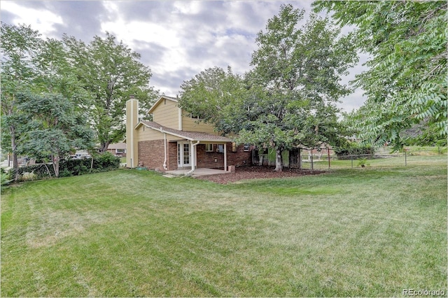 983 Xenon, Golden, CO 80401 - view of yard with a patio area