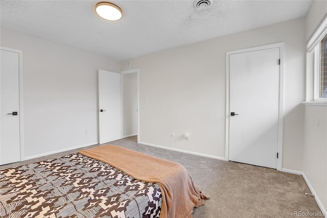 bedroom with light carpet, baseboards, and visible vents