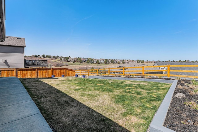view of yard featuring fence
