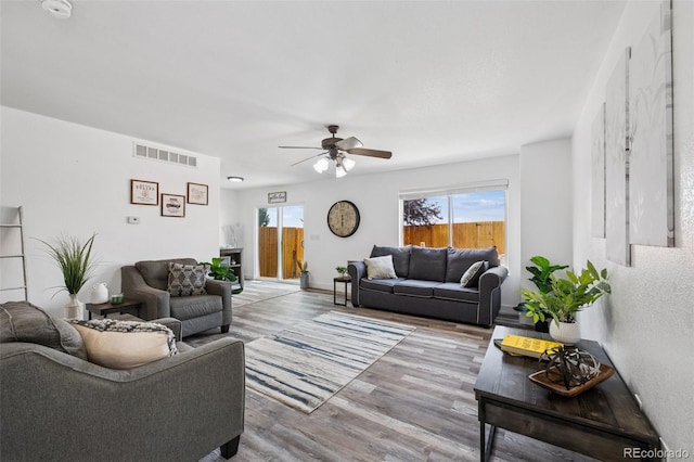 647 Berwick Ave, Firestone, CO 80520 - living room with ceiling fan and wood finished floors