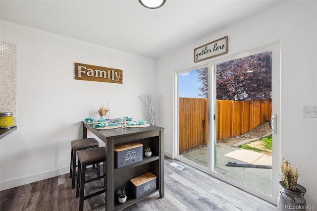 647 Berwick Ave, Firestone, CO 80520 - dining area with wood finished floors and baseboards