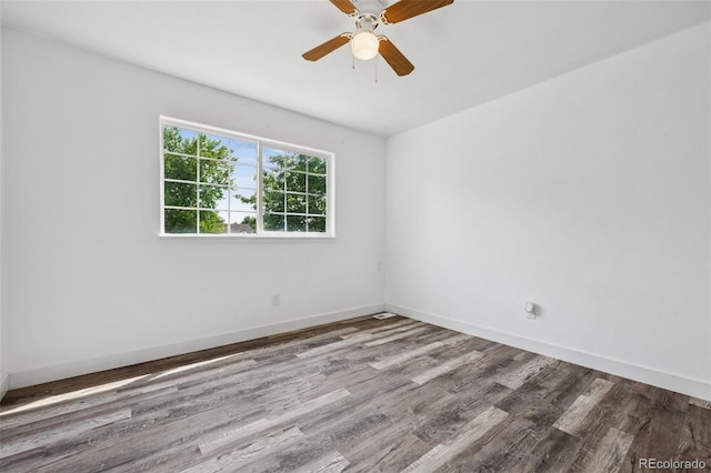 647 Berwick Ave, Firestone, CO 80520 - spare room with wood finished floors and a ceiling fan