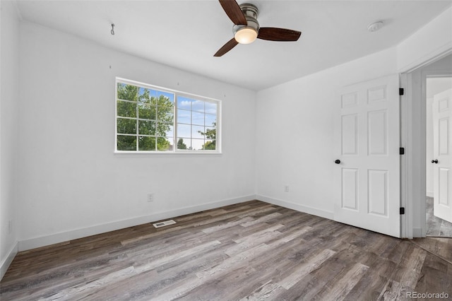 647 Berwick Ave, Firestone, CO 80520 - unfurnished bedroom with wood finished floors and a ceiling fan