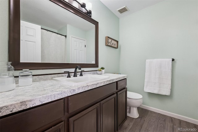 647 Berwick Ave, Firestone, CO 80520 - full bath with vanity and wood finished floors