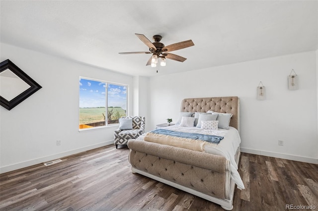 647 Berwick Ave, Firestone, CO 80520 - bedroom featuring wood finished floors and ceiling fan