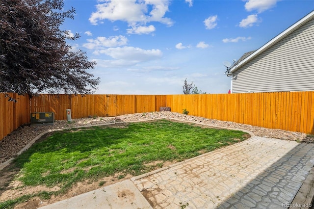 647 Berwick Ave, Firestone, CO 80520 - fenced backyard with a patio