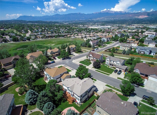 drone / aerial view featuring a mountain view