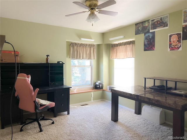 office area featuring ceiling fan and carpet floors