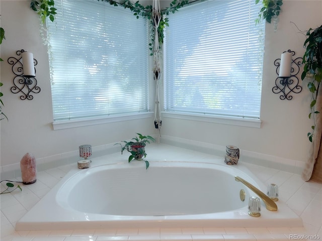 bathroom featuring tiled bath