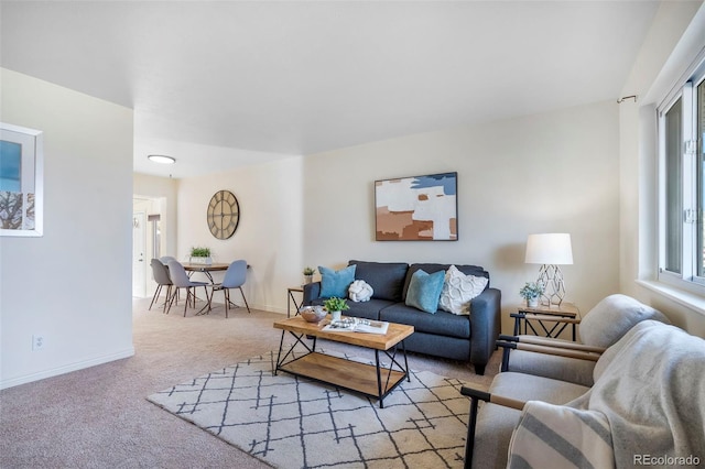 living room with light colored carpet